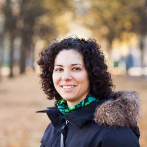 Portrait Of Happy Woman With Curly Hair At Park 2026 01 05 05 40 33 Utc