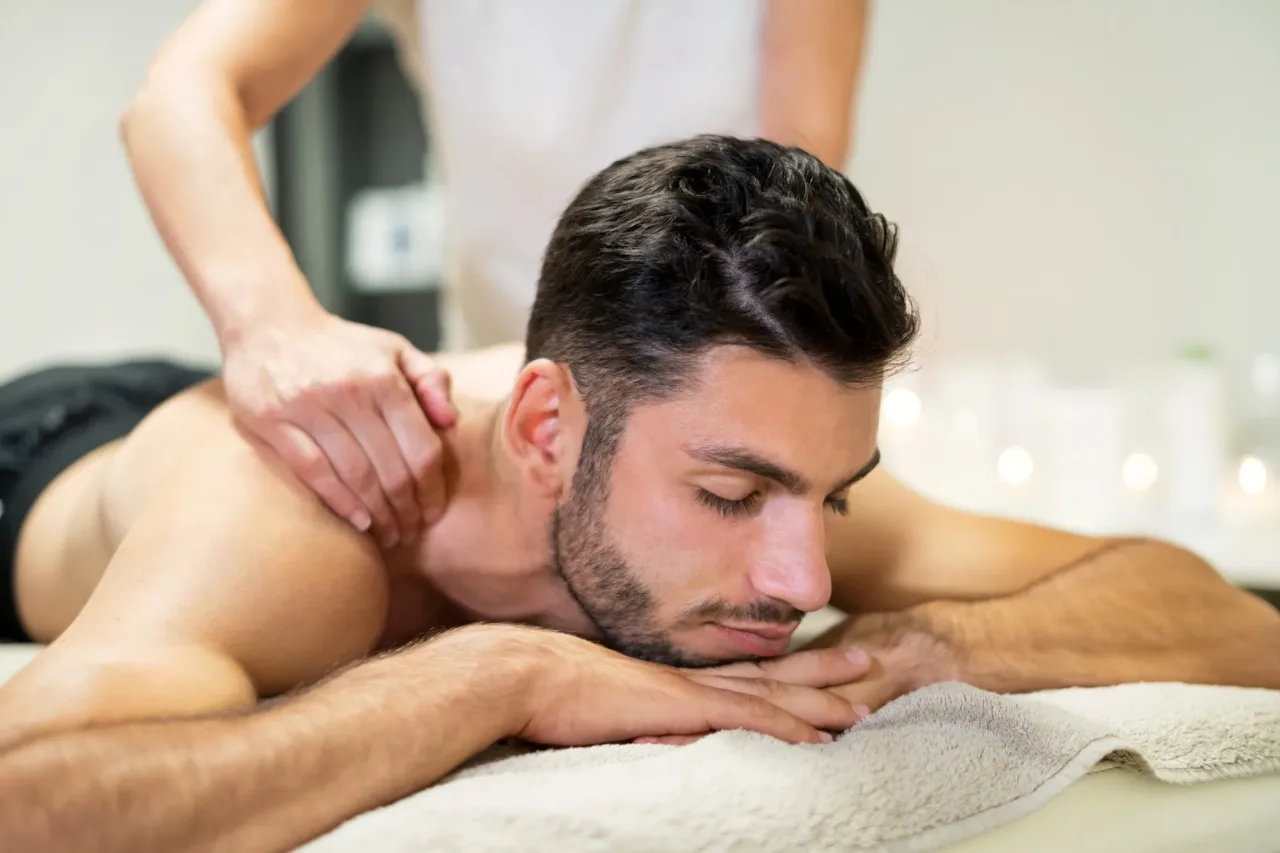 Fullon Life: Massage Expert In Zillmere, Qld 1 Man Receiving An Upper Back Massage During A Remedial Massage Session, Showcasing Deep Tissue Massage Techniques. Book Massage Today.